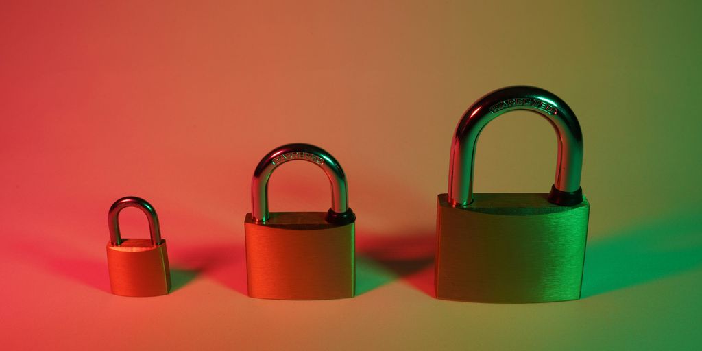 two pink padlock on pink surface